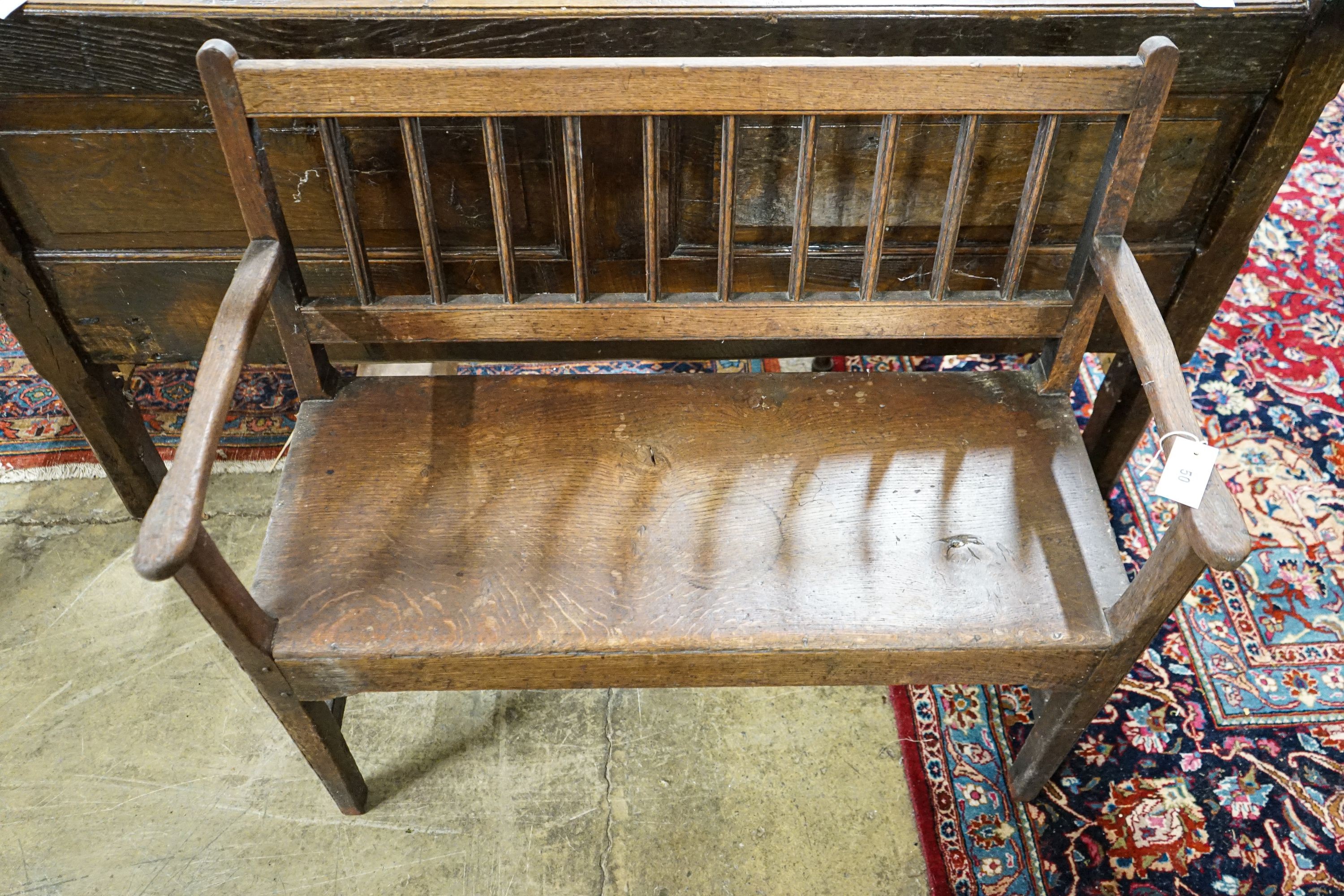 A late 18th century oak chair back settle, width 91cm, depth 38cm, height 85cm